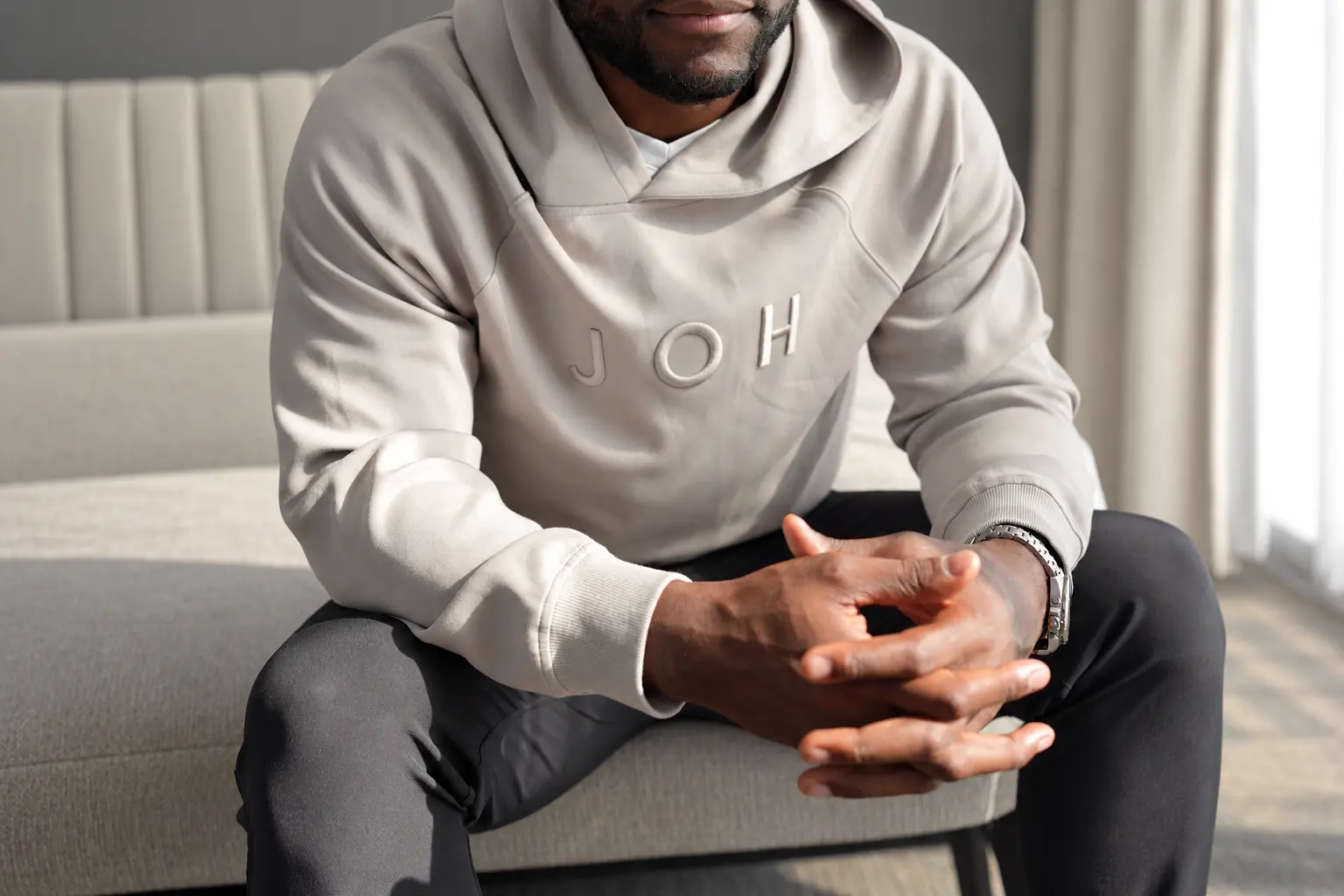 Sitting at home in a bone JOH hoodie